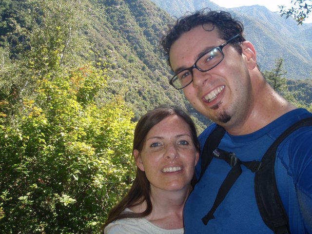 Couple Smiling on Mountain Hiking Trail