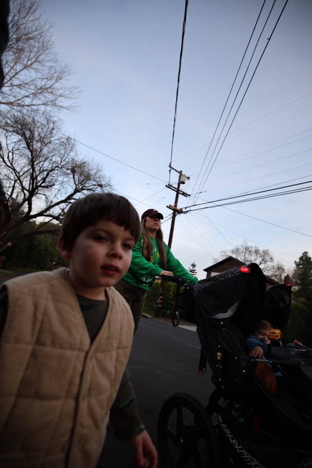 Family Evening Bike Ride on Suburban Street