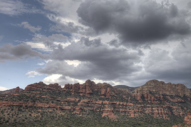 Majestic View of Sedona's Red Rocks and Clouds