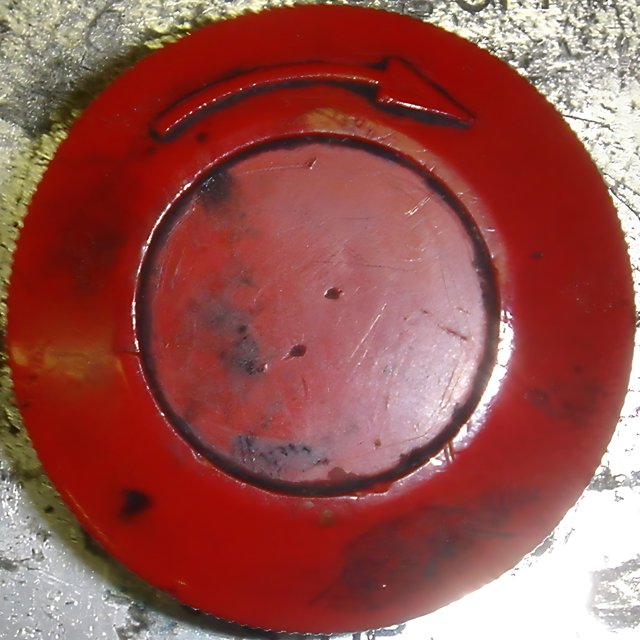The Red Plate with a Hole in the Middle