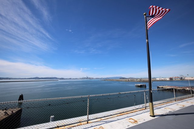 American Flag Flying Over San Francisco Bay Waters