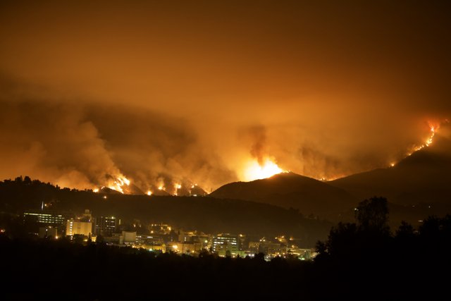 Flames Engulf the Hills and City
