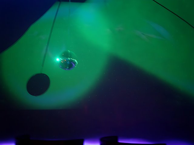 Disco Ball Under a Green Spotlight