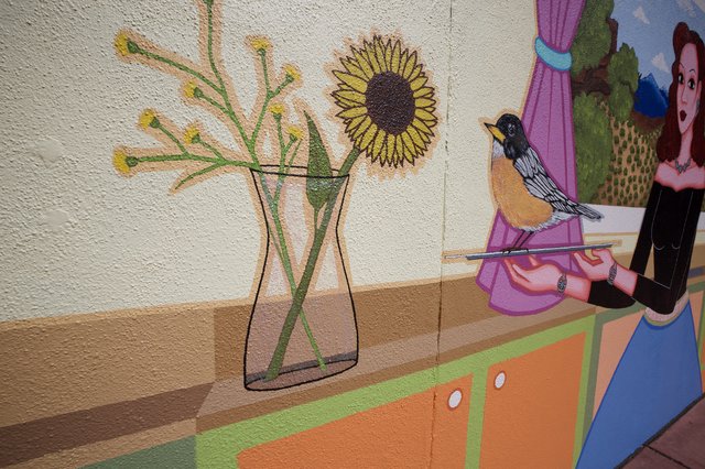 Cheerful Wall Mural with Sunflowers and Bird