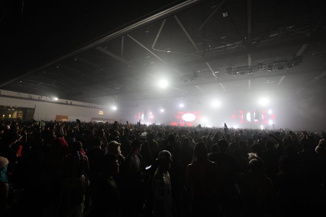 Massive Indoor EDM Festival Crowd Engulfed in Fog