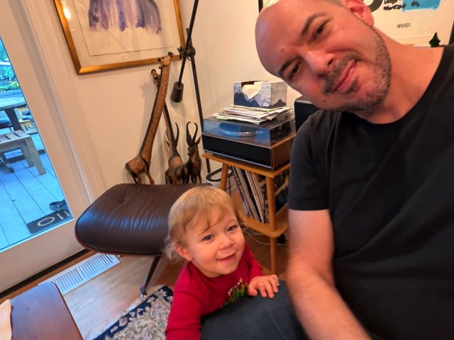 Father and Toddler Working from Home Together