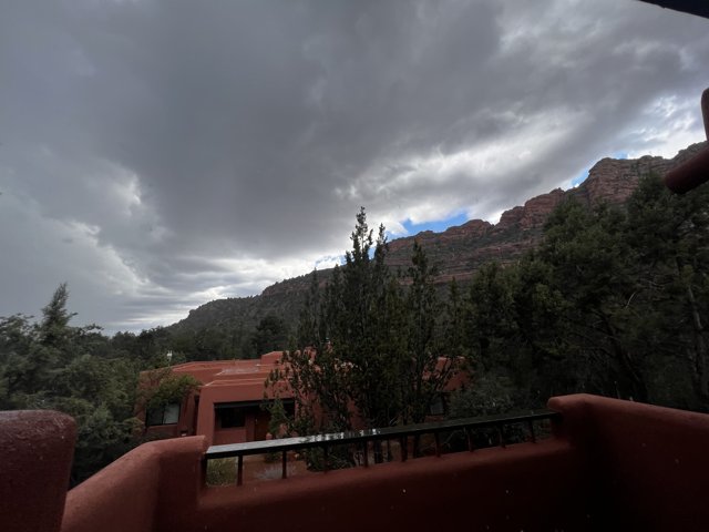 Majestic Mountains and Clouds from Balcony