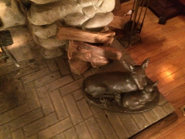 The Majestic Deer Statue on Hardwood Floor