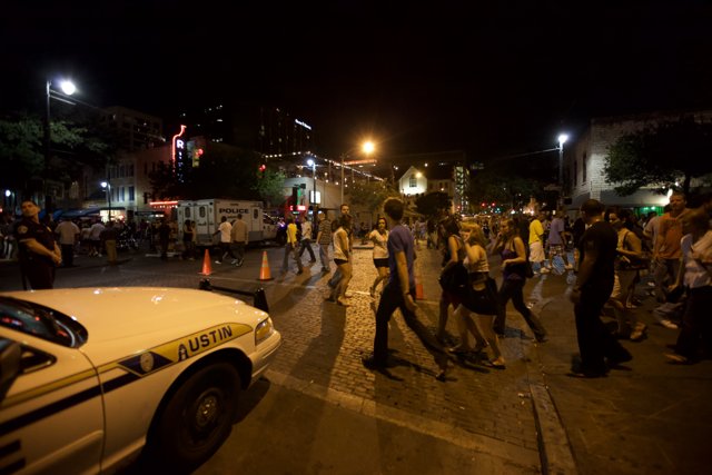 Nighttime Crowd Strolls Down Austin Street