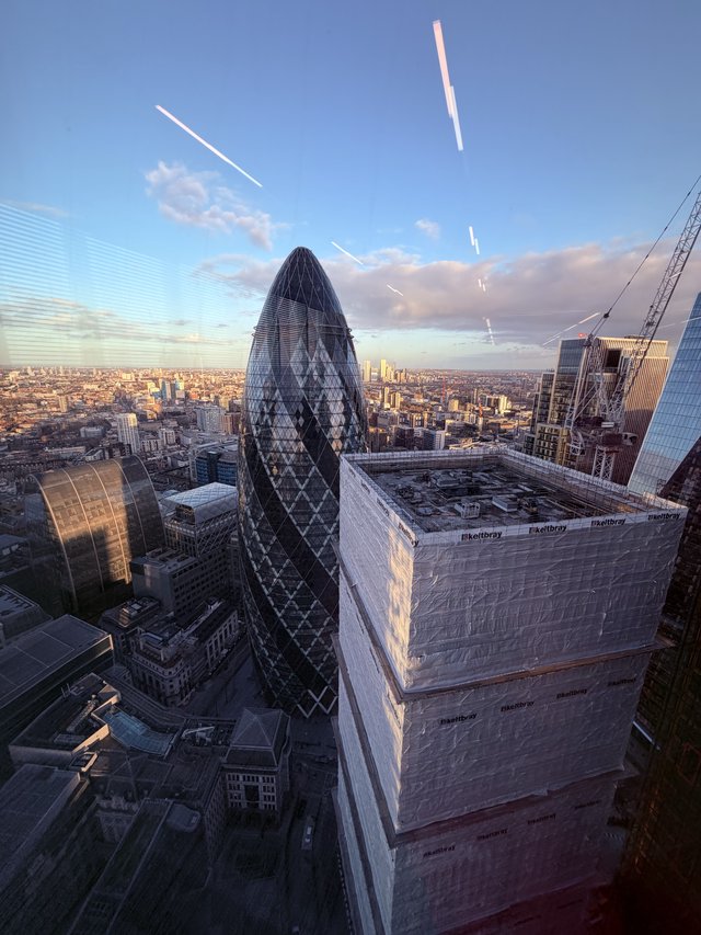 The Gherkin Tower at Golden Hour Over London Skyline