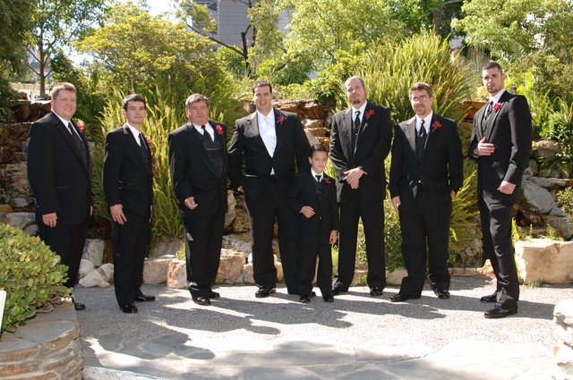 Groomsmen Pose Outdoors at Summer Wedding Celebration