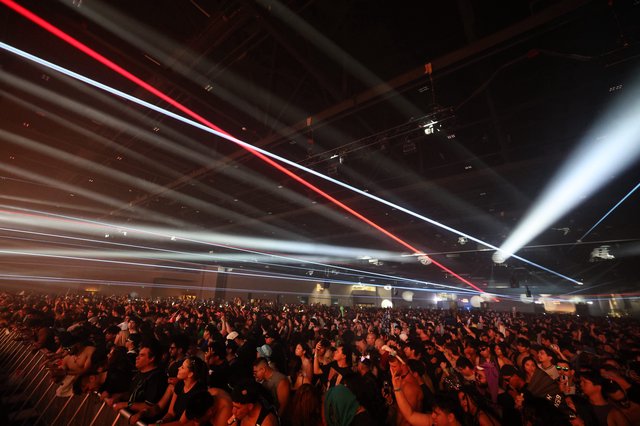 Laser Light Storm Over Massive Festival Crowd