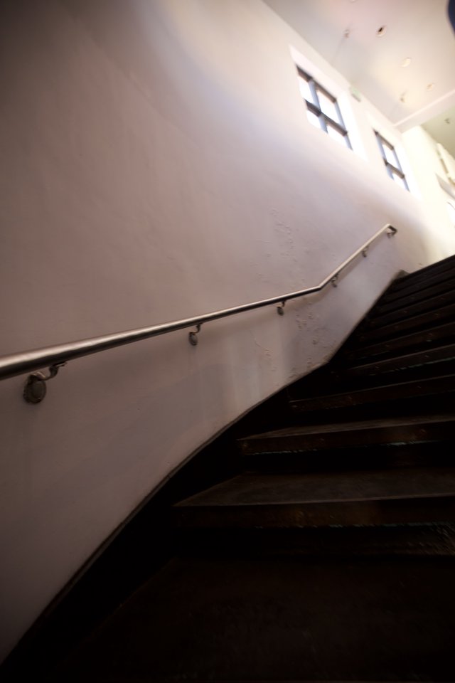 Ascending the Shadows: Minimalist Stairwell Perspective