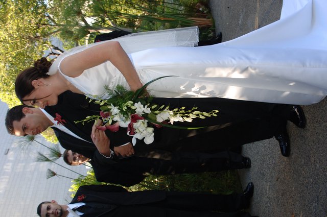 Bride and Groom Exchange Rings at Outdoor Ceremony