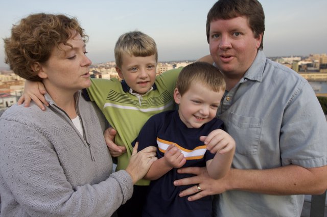 Family Portrait on Rooftop Terrace at Dusk