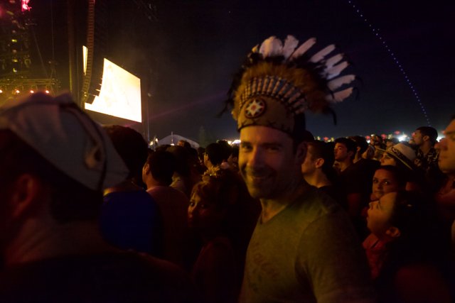 Man in Indian Headdress Stands Out in Coachella Crowd