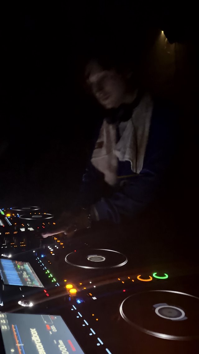 DJ Performing with Pioneer CDJ Controller Setup in London