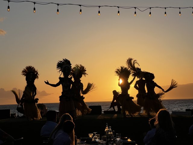 Sunset Hula Performance at a Hawaiian Restaurant