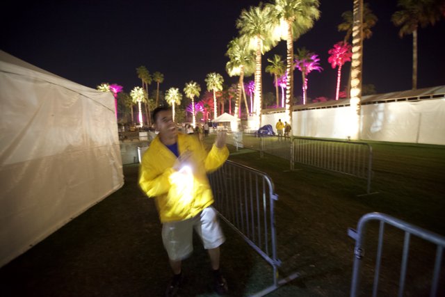 Yellow Jacketed Man Enjoys the Polo Club at Night