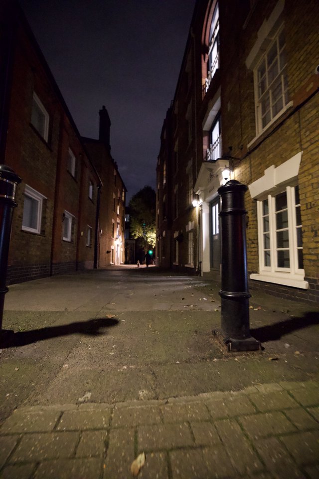 Narrow Cobblestone Alley at Night in London