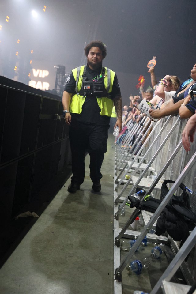 Security Guard Patrols Concert Barrier at Wobbleland 2026