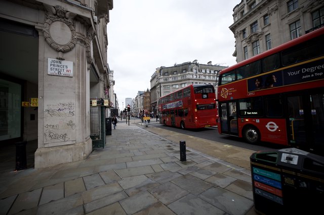 Red Double-Decker Buses on John Princes Street, London