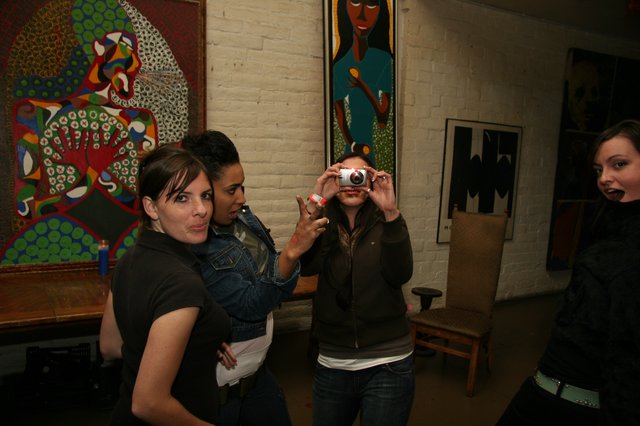 Friends Capture Moments at an Art Gallery Opening