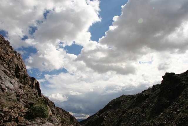 Canyon glimpse of the Cumulus clouds and Mountain Range