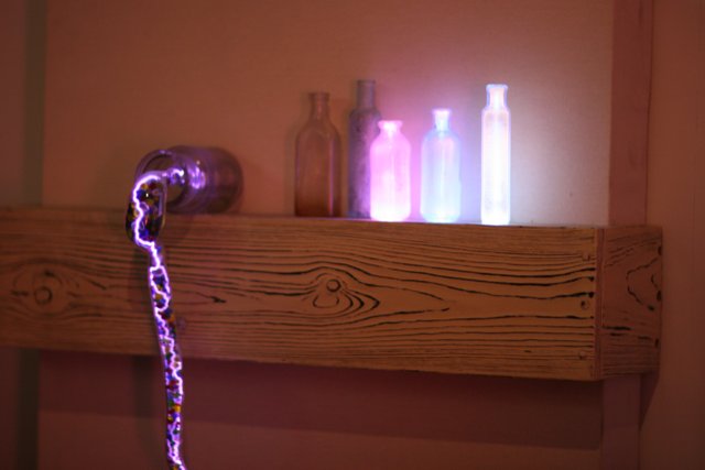 Illuminated Shelf with Wooden Containers