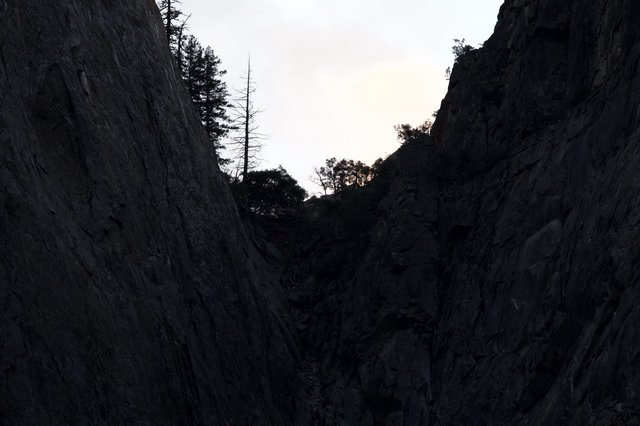 Twilight View Through Narrow Rock Chasm in Yosemite