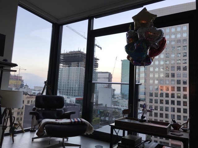 Window View with Balloons