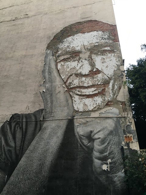 The Smiling Mural Man