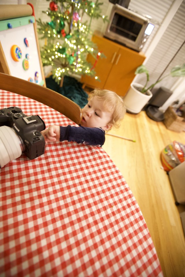 Toddler Reaching for Camera at Christmas Morning