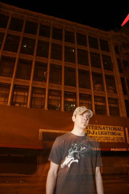 Nighttime Portrait in Front of Urban Building