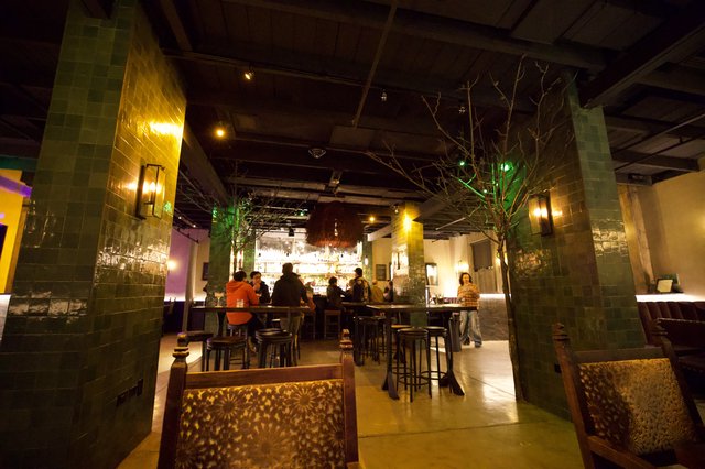 Modern Restaurant Bar Interior with Warm Ambient Lighting
