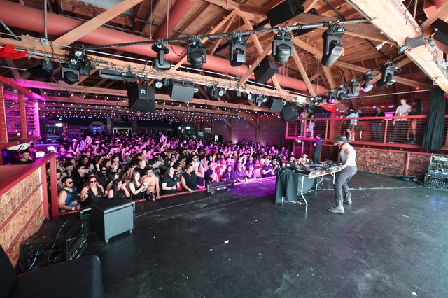DJ Performs at Packed Wobbleland Festival Venue