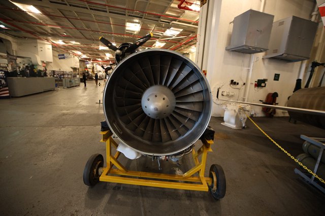 Aircraft Jet Engine on Display in Maintenance Hangar