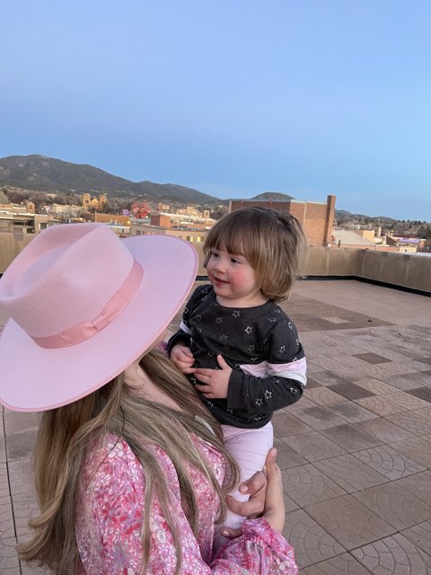 Mother and Daughter in a Pink Hat