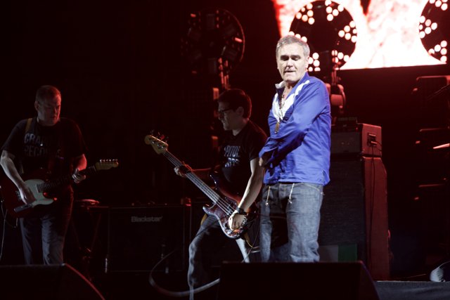 Morrissey and Boz Boorer Perform a High-Energy Concert on Stage with Two Guitars
