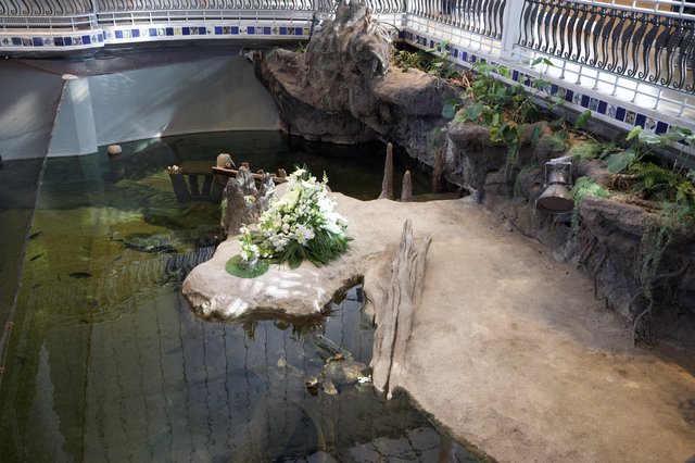 Memorial Garden with White Floral Tribute Display