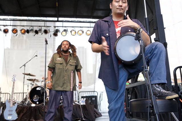 Blue Pants and Drum Set at Grand Performances Ozomatli
