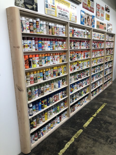 The Colorful Array of Paints on a Los Angeles Shelf