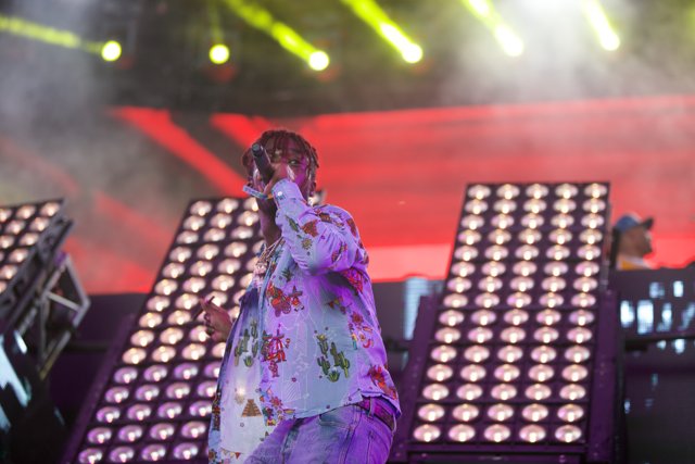 Floral shirted performer in the spotlight