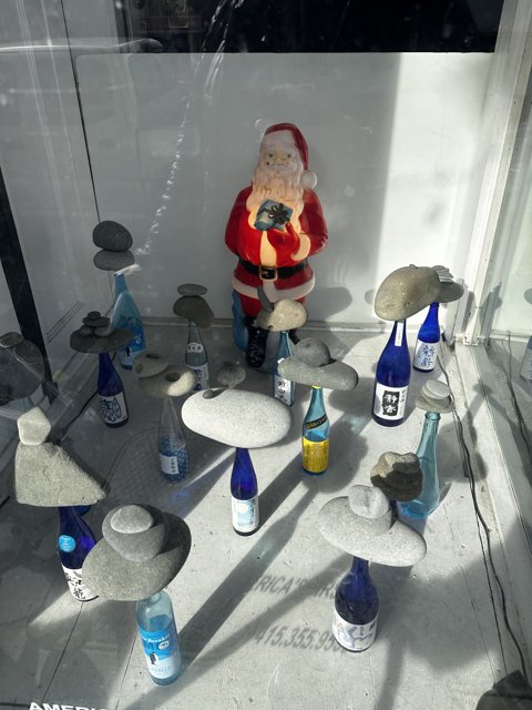 Santa Claus Statue among the Bottles