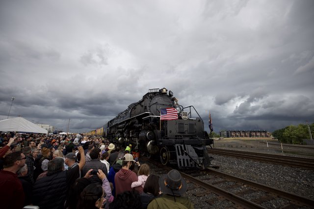 Historic Big Boy Locomotive Display Under Stormy Skies
