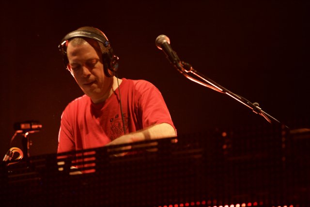 Red-Shirted DJ Rocks the Stage