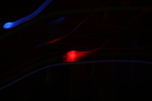 Red and Blue Laser Lights in the Dark