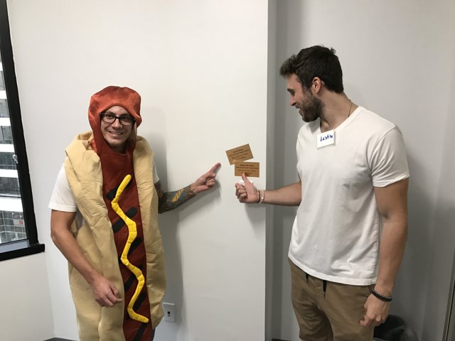 Two Men in Hot Dog Costumes Make a Statement