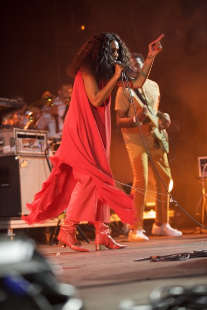 Solange Rocks the Stage in Red Dress