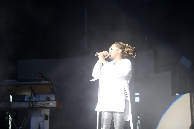 Woman in White Shines Bright on Stage